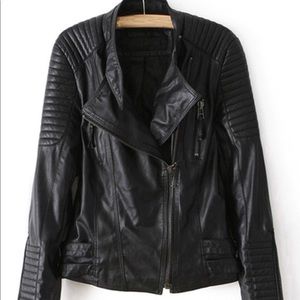 Black cruelty-free vegan leather jacket.